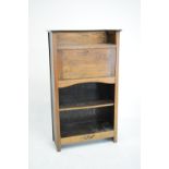 Early 20th Century oak bookcase with fall-front writing surface enclosing pigeon holes, 72cm wide