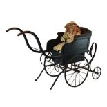 Late Victorian green painted wooden and iron perambulator (pram), with deep-buttoned hide seat-