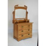 Late 19th/early 20th Century satin walnut dressing chest with mirror over fitted three long drawers,