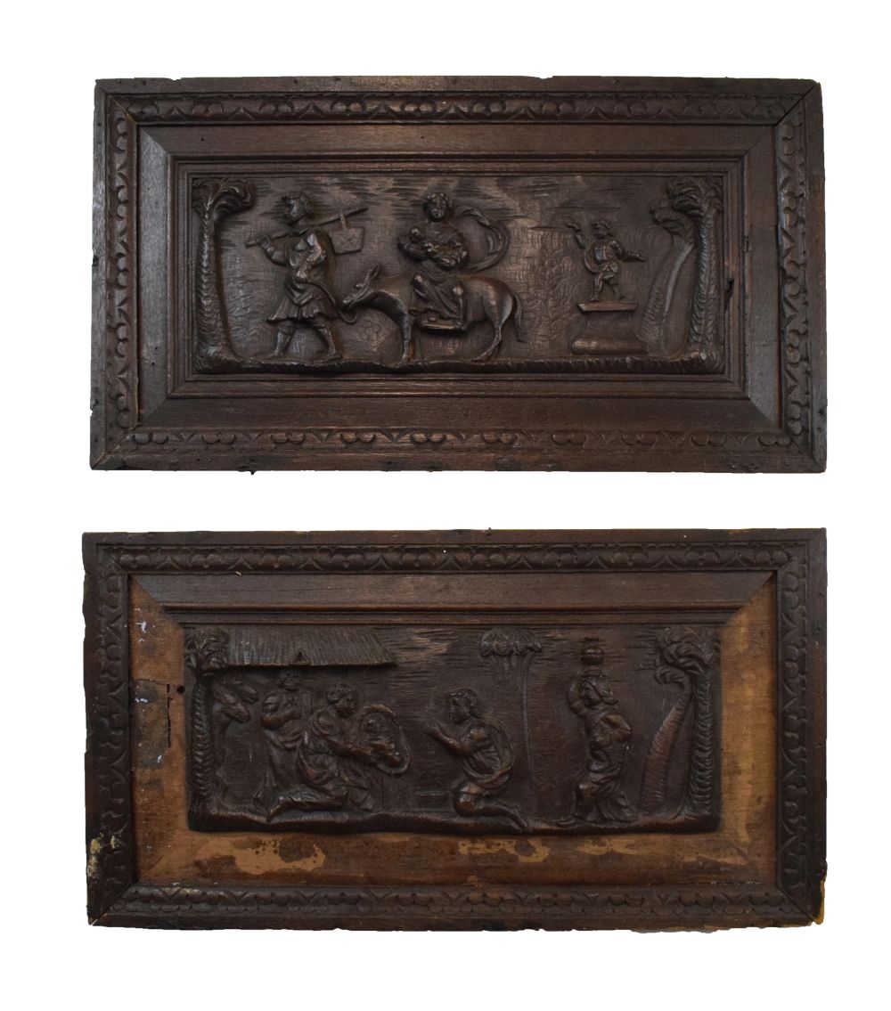 Pair of 18th Century Continental carved walnut panels depicting the Adoration of the Magi and the