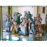 Assorted Continental bisque porcelain figures to include three pairs, largest 32.5cm high (8)