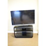 Sony Bravia 40-inch television, remote and stand