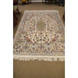 Tunisian handmade wool rug, with label beneath, 175cm x 252cm