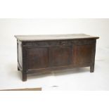 WITHDRAWN - 18th Century oak coffer having triple fielded panel front and hinged cover, 140cm wide