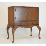 Mid 20th Century figured walnut veneered cocktail cabinet, 85cm wide