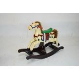 Painted wooden child's rocking horse, 64cm high x 79cm