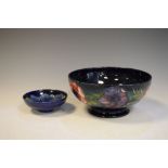 Moorcroft 'Peony' pattern bowl, 21cm diameter, together with small dish having large flower to