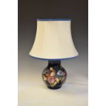 Moorcroft 'Orchid' pattern table lamp, 21cm high