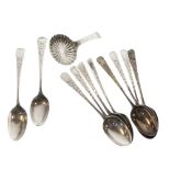 Georgian silver caddy spoon with fan-reeded oval bowl and bright cut engraved handle, date