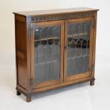 Reproduction old charm style oak bookcase fitted two leaded glazed doors, 94.5cm wide