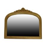 Gilt overmantel mirror of arched design, 105cm wide x 89cm high