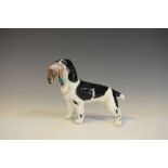 Alton figure of a Pointer with a duck in its mouth, 14cm high