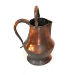 Large copper jug having a swing handle, 50cm high overall