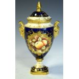 Coalport lidded urn, having central fruit decoration, 25cm high