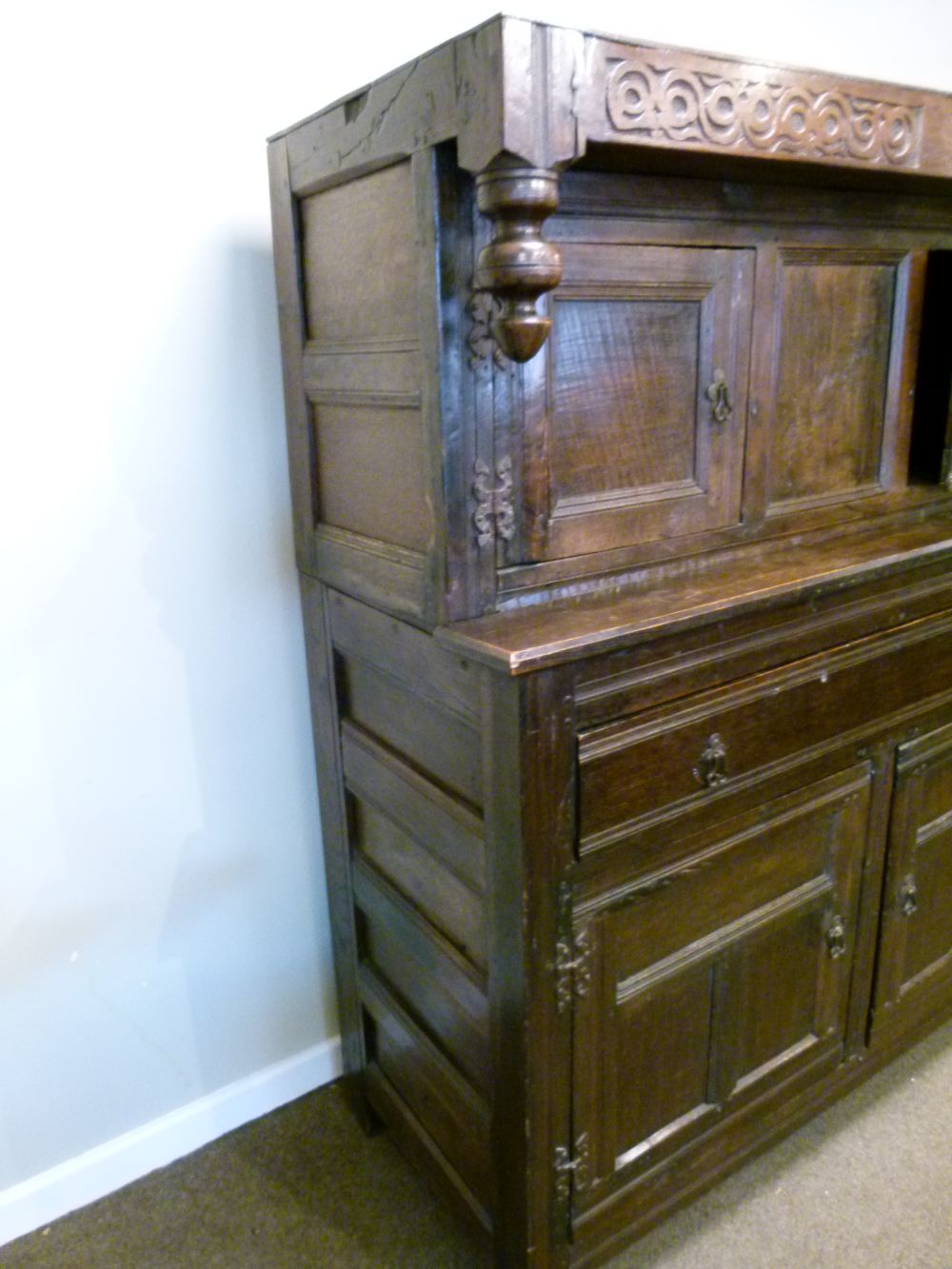 Antique oak heavily carved court cupboard fitted two geometric carved panel doors, the base with a - Image 9 of 10