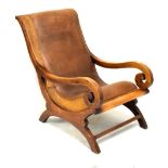 Mahogany scroll arm plantation chair having brown hide upholstery
