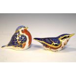 Two Royal Crown Derby porcelain paperweights of birds, boxed