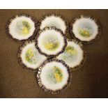 Set of thirteen Staffordshire hand painted dessert plates having floral decoration bearing Oslers