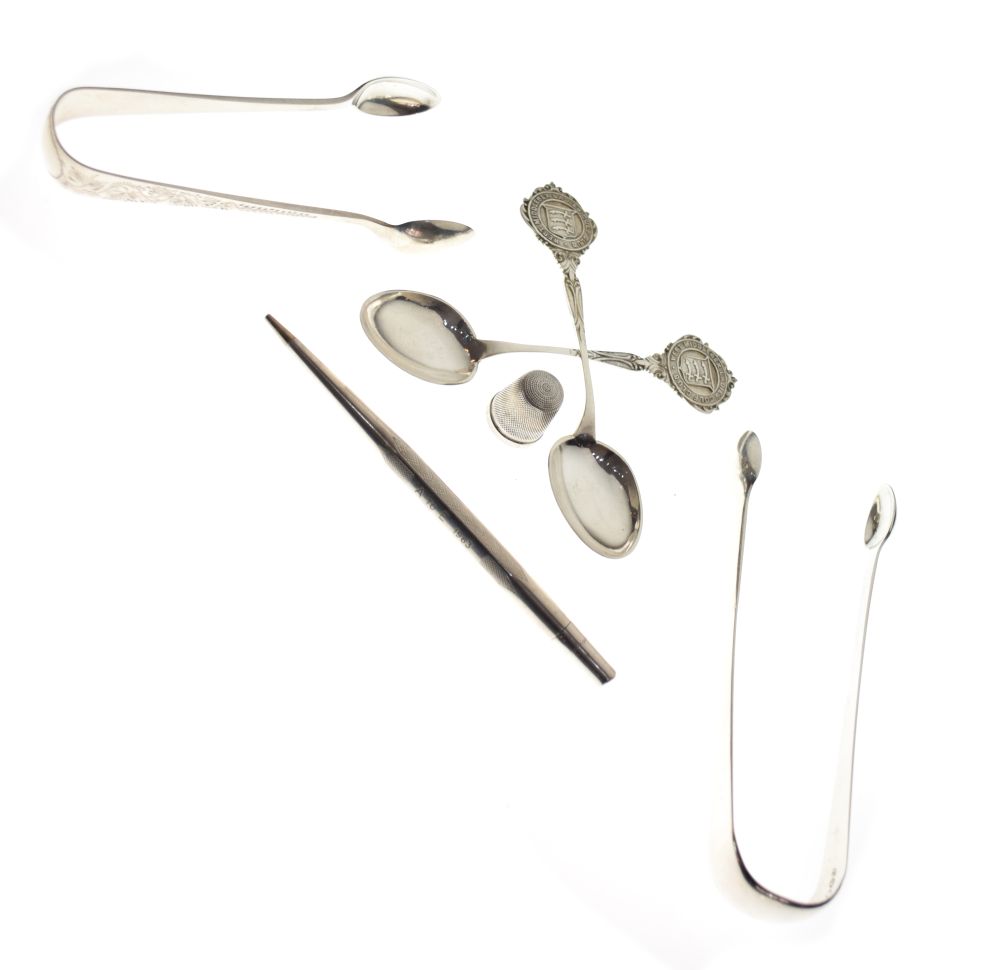 Small collection of silver items to include Georgian pair of sugar tongs, pair of teaspoons with the