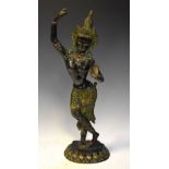 South East Asian bronze figure of a standing female deity, 49cm high