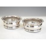 Two silver plated wine coasters, 9cm diameter