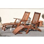 Pair of teak loungers with cushions