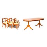 Reproduction mahogany twin pedestal dining suite comprising: table with one leaf and six chairs