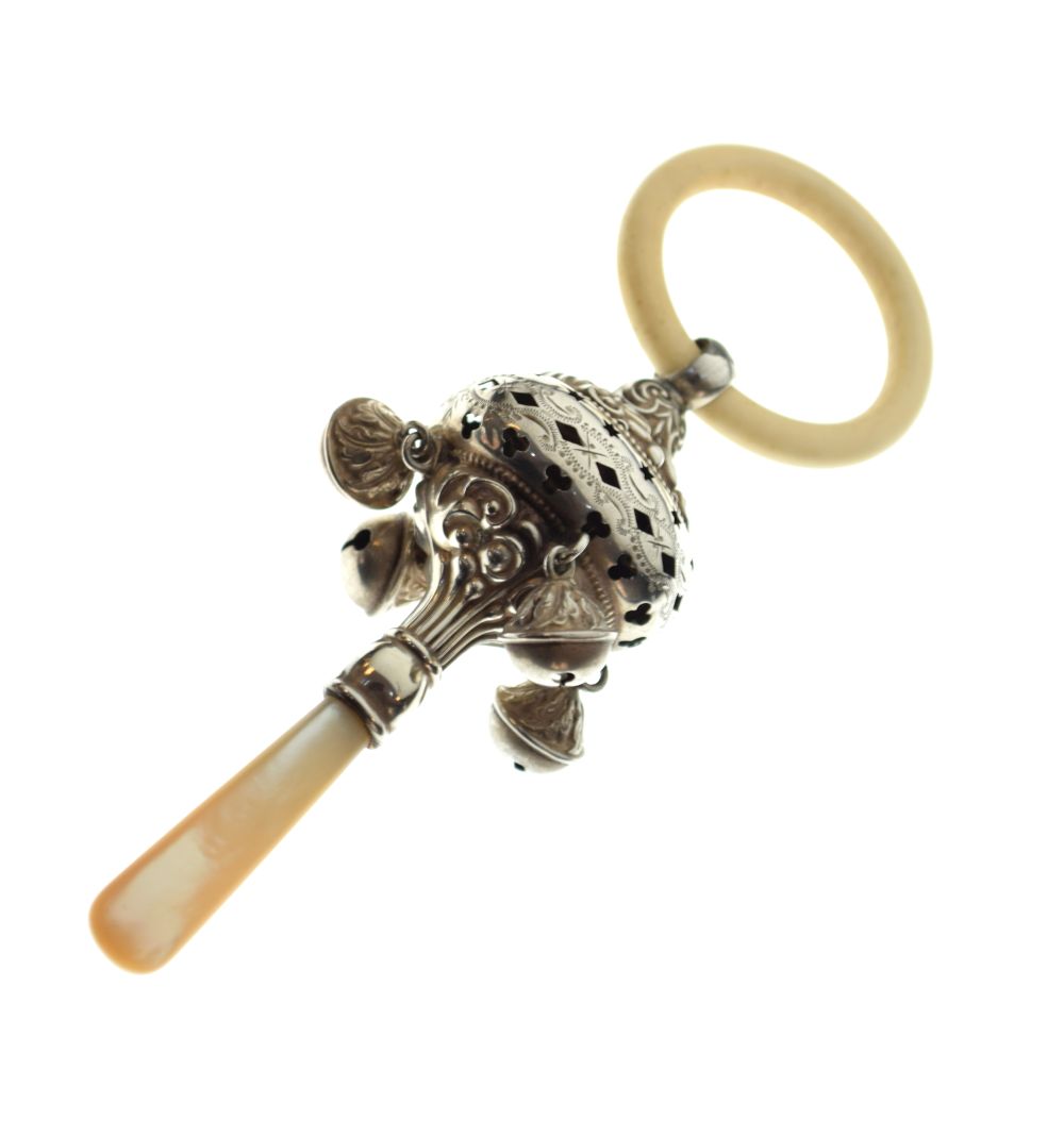 George V silver child's rattle and teething ring having four suspended bells and mother-of-pearl