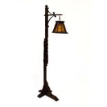 Early 20th Century oak adjustable height standard lamp