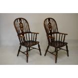 Pair of reproduction elm seat Windsor type arm chairs