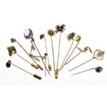 Collection of gold and gold coloured metal stickpins, silver cufflinks, dress rings, etc