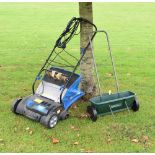 Lawn raker, electric scarifier and lawn raker and a fertiliser