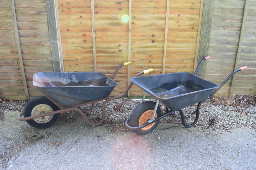 Two builders wheelbarrows