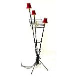 Painted wrought metal standard lamp in the form of a music stand, fitted three lights, 170cm high