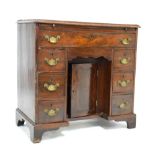Georgian mahogany kneehole desk fitted seven drawers with slide, 79.5cm wide