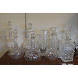 Quantity of cut glass decanters, carafes etc