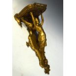 19th/20th Century carved gilt gesso wall bracket formed as an angel with arms aloft supporting a