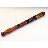 Victorian painted wooden police truncheon with VR cipher and ribbed grip, 42cm long