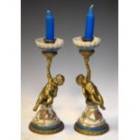 Pair of reproduction brass and ceramic candlesticks, 25.5cm high