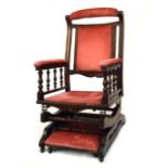 American walnut framed rocking chair and footstool