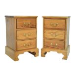 Pair of pitch pine bedside chests of three drawers, 40cm wide