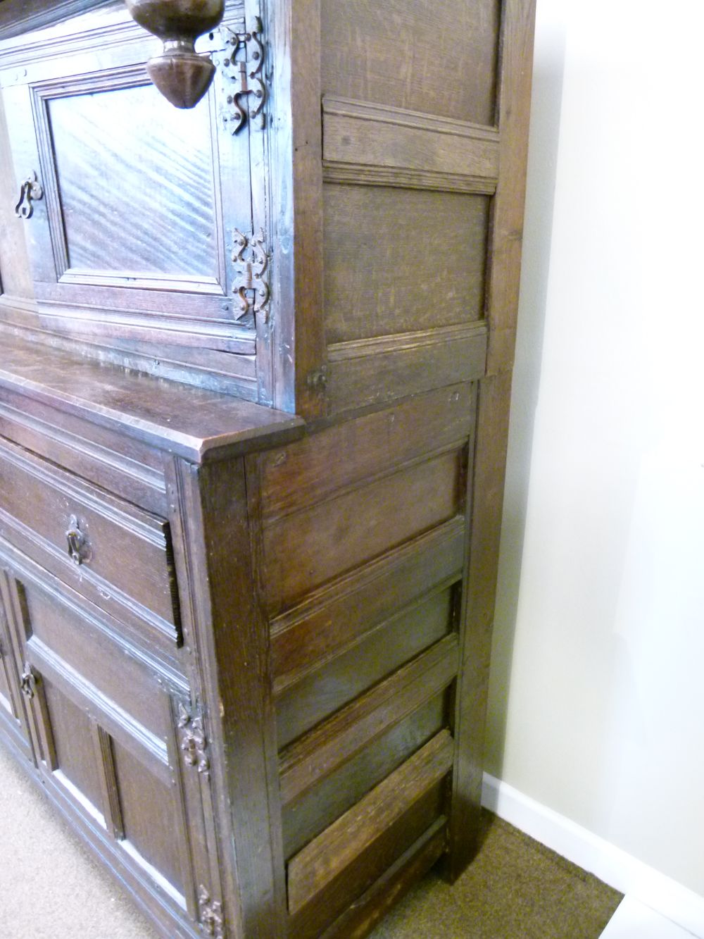 Antique oak heavily carved court cupboard fitted two geometric carved panel doors, the base with a - Image 8 of 10