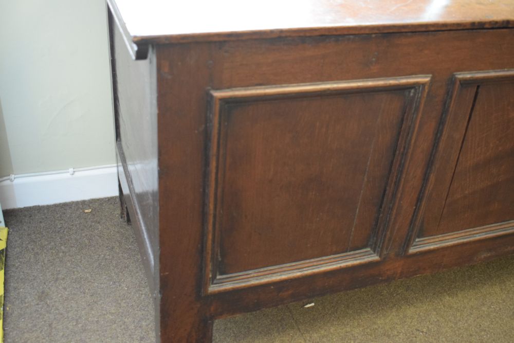 18th Century oak coffer having triple fielded panel front and hinged cover, 135cm wide - Image 2 of 5