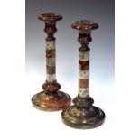 Pair of serpentine octagonal column candlesticks, 37cm high