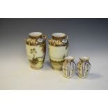 Two large Noritake two handled vases having woodland decoration, 25cm high, together with two