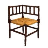Early 20th Century mahogany ball turned rush seat corner chair
