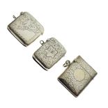 Three early 20th Century silver vesta cases with engraved floral decoration, Birmingham 1900, 1902