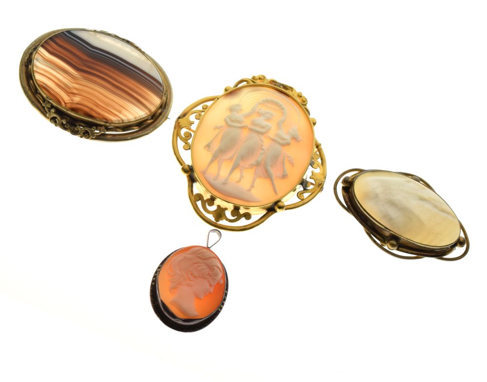 Gilt metal mounted oval cameo depicting The Three Graces, one other cameo pendant, agate set