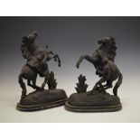 Pair of spelter Marley horses, 43cm high