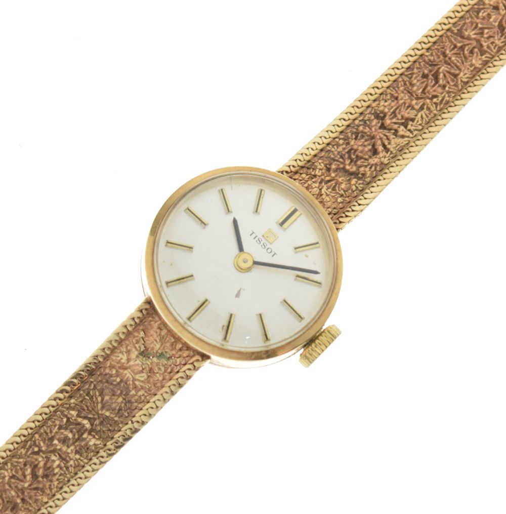 Tissot - Lady's 9ct gold cased cocktail watch having conforming bracelet